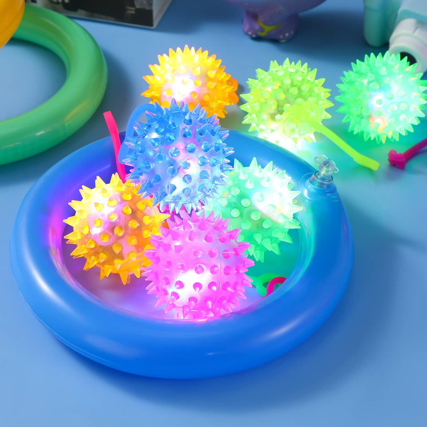 Sotiff 100 Pcs Light up Ball Spiky LED Bouncy Ball Flashing Squeaky Multicolor Puffer Toy Rubber Sensory Toy Carnival Prizes Bulk Party Favors for Teens, Adults, Children